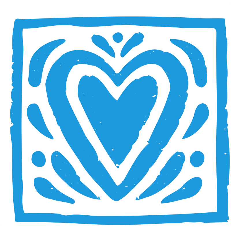 A decorative blue Talavera tile designed with a heart.
