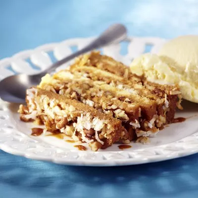 Pastel en Capas de Dulce de Leche, Coco y Nuez